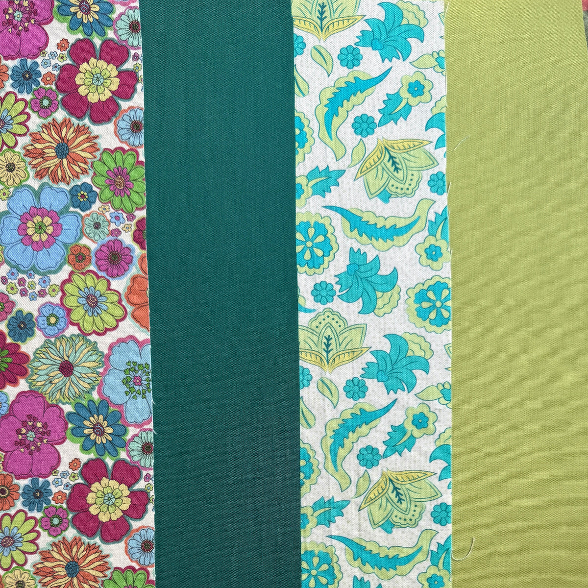 Four fabrics side by side showing multicoloured 60s flowers, plain teal, teal and lime flowers on white, and plain lime.