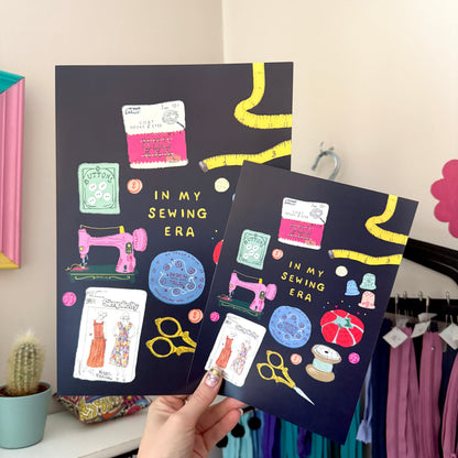 Navy In My Sewing Era A4 and A5 print  featuring colourful vintage sewing tools and accessories.