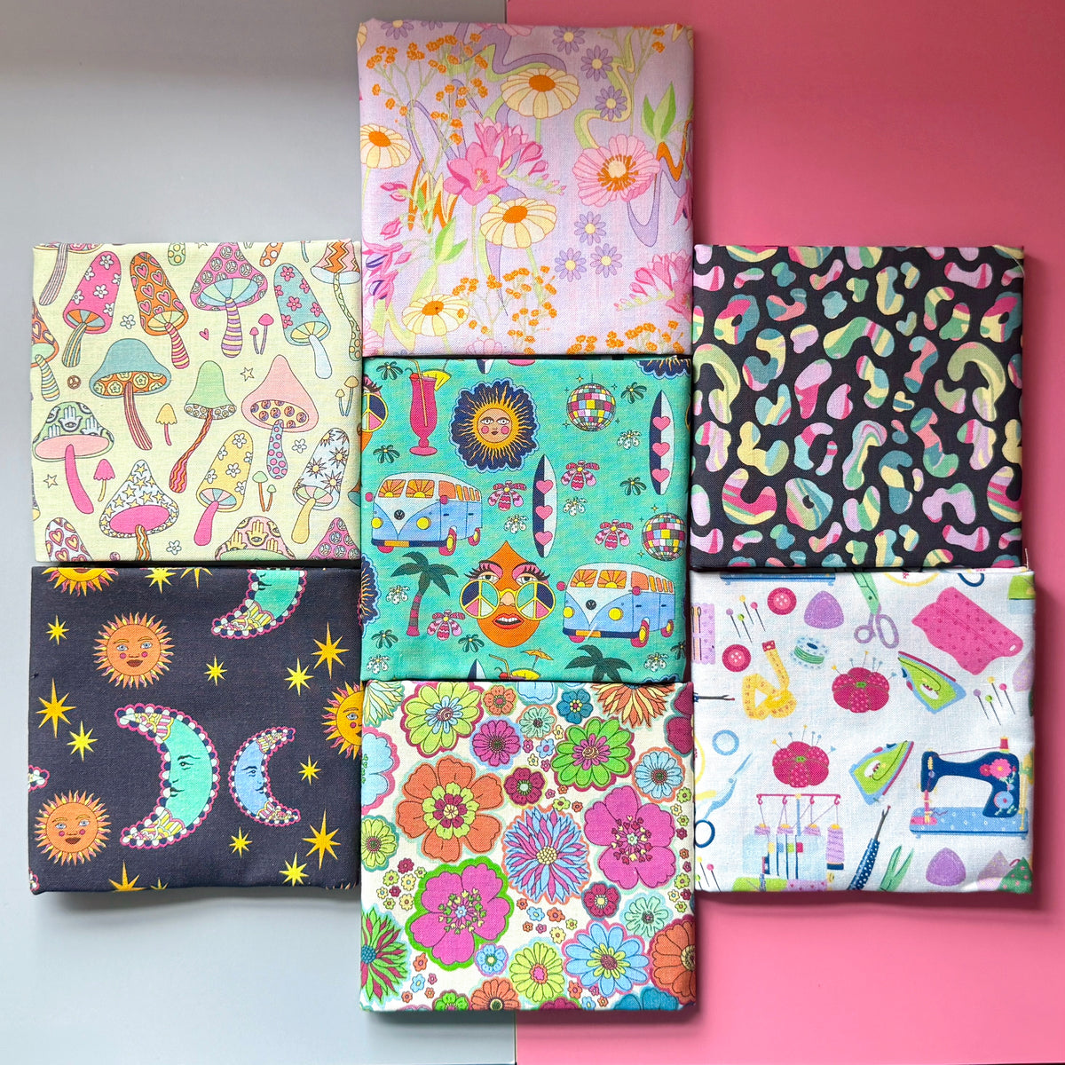 Seven ByLouMoffat fat quarters laid out to show each colourful floral, celestial, mushroom, leopard, hippie and sewing-themed print.