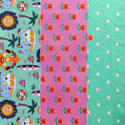 Three coordinating fabric prints side by side: retro campervans and sunshine faces on mint, orange flowers on pink and tiny hearts on mint.