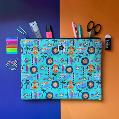 Large turquoise Hippie Pouch with retro print, shown with pens, a ruler, scissors and other stationery. The fabric a colourful retro design featuring camper vans, palm trees, suns, disco balls, surfboard and cocktail glasses.