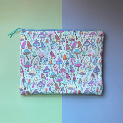 Back of the large zip pouch, showing an all-over colourful mushroom pattern and pale blue zip.